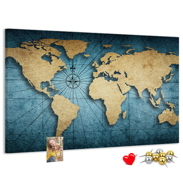 Prikbord oude wereldkaart met kompas
