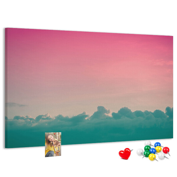 Prikbord zonsondergang boven de wolken in pastelkleuren