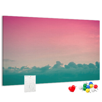 Prikbord zonsondergang boven de wolken in pastelkleuren