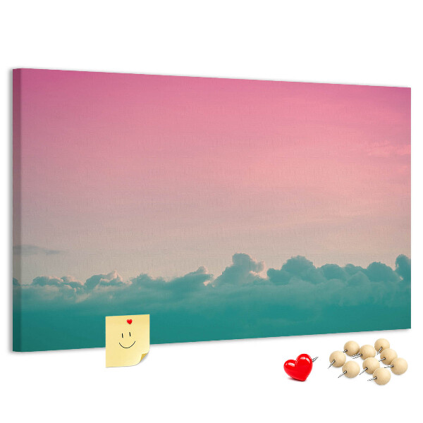 Prikbord zonsondergang boven de wolken in pastelkleuren