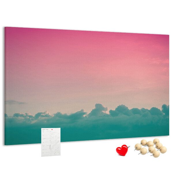 Prikbord zonsondergang boven de wolken in pastelkleuren