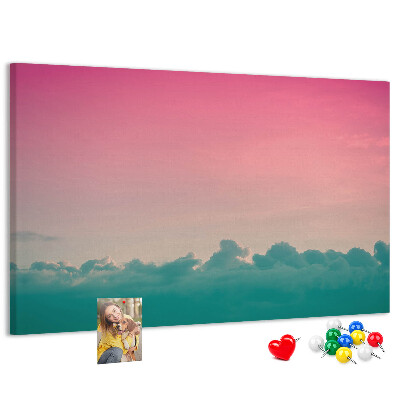 Prikbord zonsondergang boven de wolken in pastelkleuren