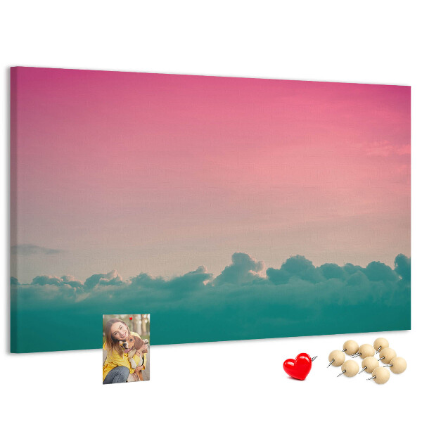 Prikbord zonsondergang boven de wolken in pastelkleuren