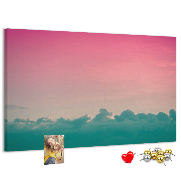 Prikbord zonsondergang boven de wolken in pastelkleuren