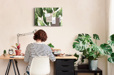 Kurk prikbord met print van tropische bladeren in verschillende tinten groen