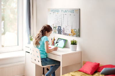 Kurkbord met kleurrijke weekplanner en dierenprint