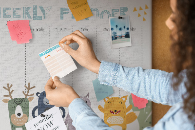 Kurkbord met kleurrijke weekplanner en dierenprint