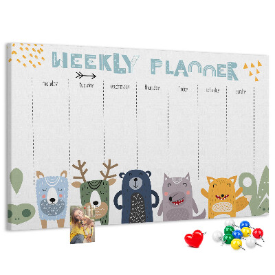 Kurkbord met kleurrijke weekplanner en dierenprint