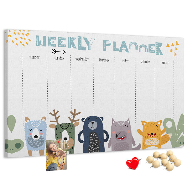 Kurkbord met kleurrijke weekplanner en dierenprint