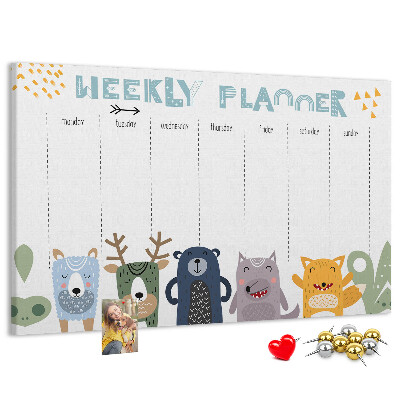 Kurkbord met kleurrijke weekplanner en dierenprint