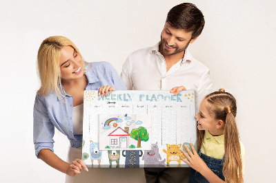 Kurkbord met kleurrijke weekplanner en dierenprint