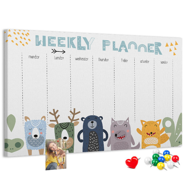 Kurkbord met kleurrijke weekplanner en dierenprint