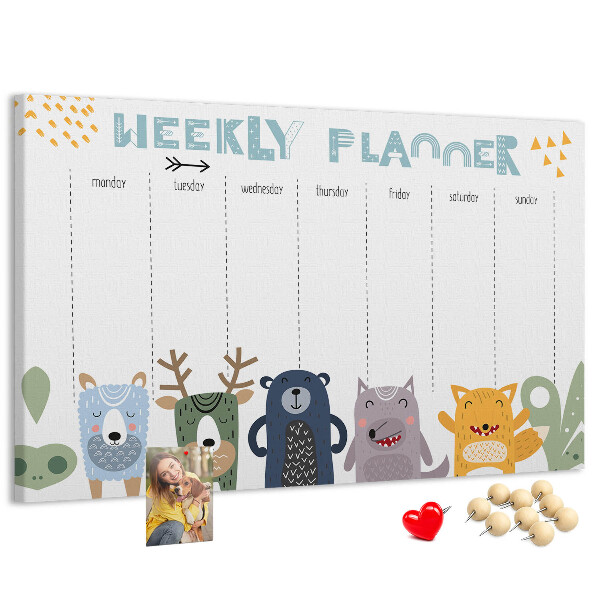 Kurkbord met kleurrijke weekplanner en dierenprint