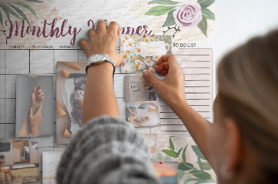 Kurken prikbord maandkalender met bloemenaccenten