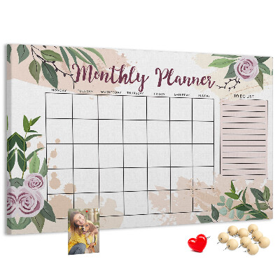 Kurken prikbord maandkalender met bloemenaccenten