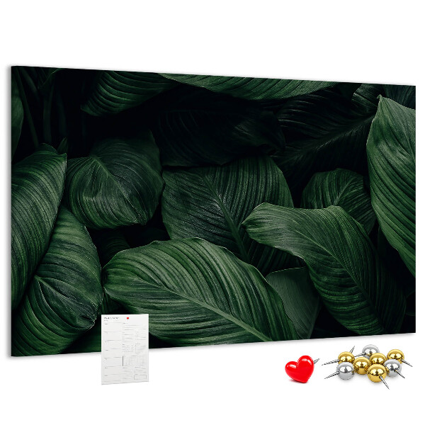 Kurken prikbord met een motief van groen vlechtwerk met bladeren