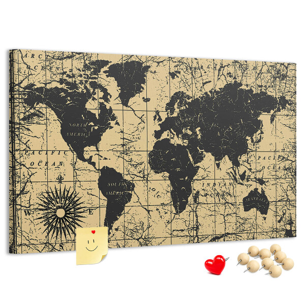 Prikbord met een oude wereldkaart in zwart en goud