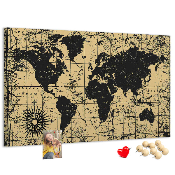 Prikbord met een oude wereldkaart in zwart en goud