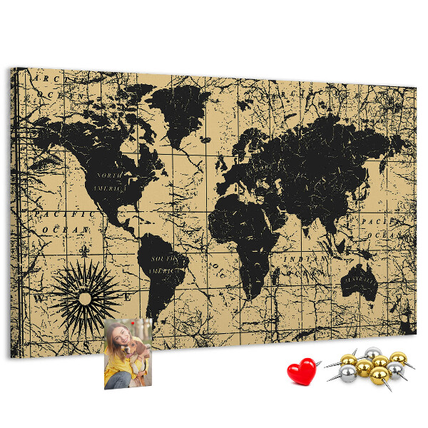 Prikbord met een oude wereldkaart in zwart en goud
