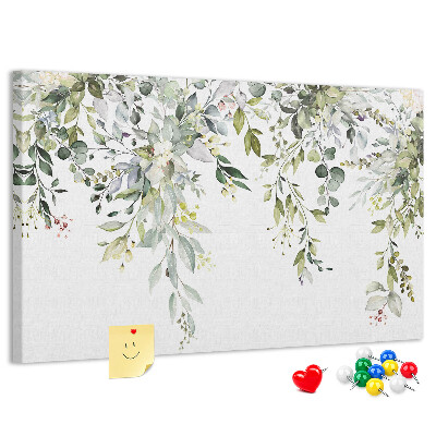 Kurken prikbord met een motief van groene bladeren en tere bloemen