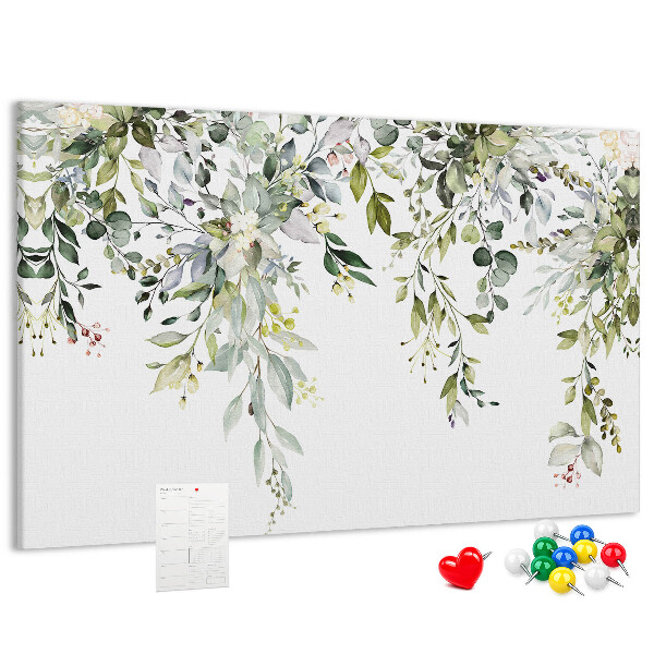 Kurken prikbord met een motief van groene bladeren en tere bloemen