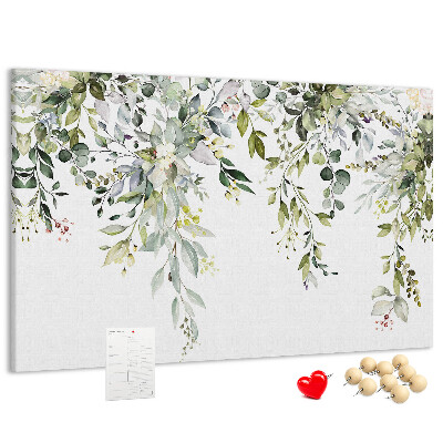 Kurken prikbord met een motief van groene bladeren en tere bloemen