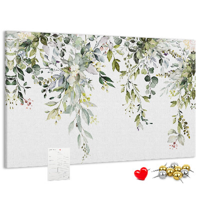 Kurken prikbord met een motief van groene bladeren en tere bloemen