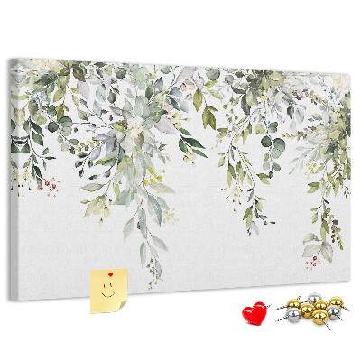 Kurken prikbord met een motief van groene bladeren en tere bloemen