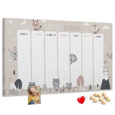 Kurkbord met bosdieren op de weekplanner