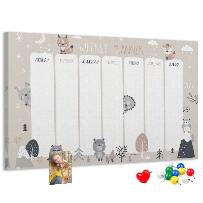 Kurkbord met bosdieren op de weekplanner