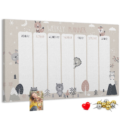 Kurkbord met bosdieren op de weekplanner