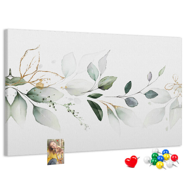 Prikbord met fijne blaadjes en gouden accenten