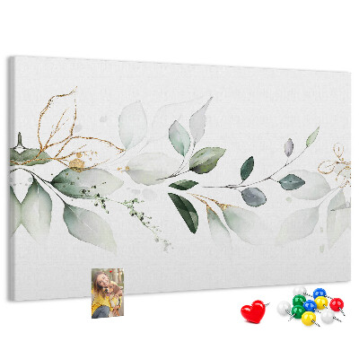 Prikbord met fijne blaadjes en gouden accenten