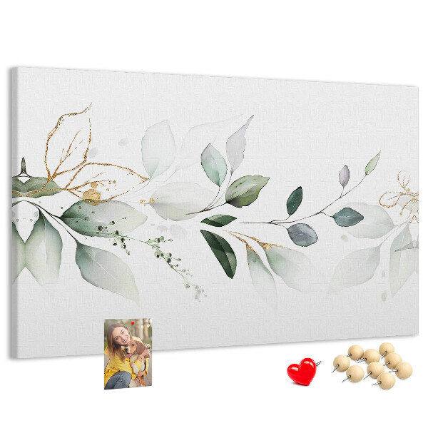 Prikbord met fijne blaadjes en gouden accenten