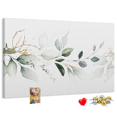 Prikbord met fijne blaadjes en gouden accenten