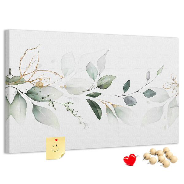 Prikbord met fijne blaadjes en gouden accenten