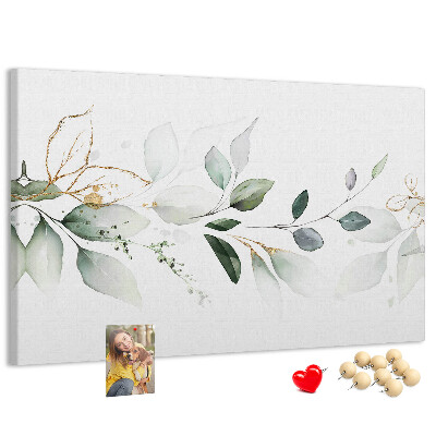 Prikbord met fijne blaadjes en gouden accenten