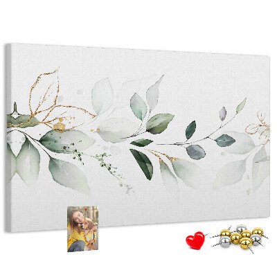 Prikbord met fijne blaadjes en gouden accenten