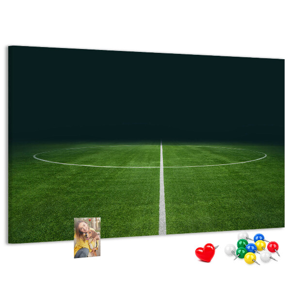 Kurk prikbord voetbalveld met belijning en gras