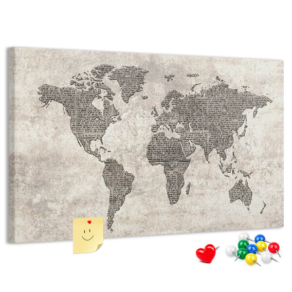 Prikbord met een wereldkaart en krantentextuur