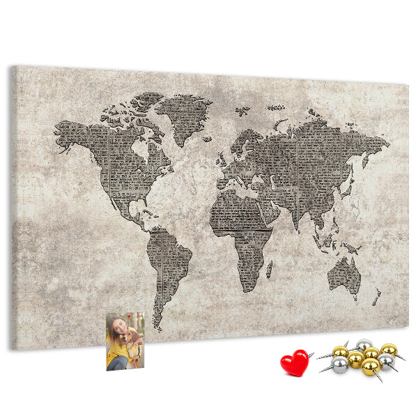 Prikbord met een wereldkaart en krantentextuur