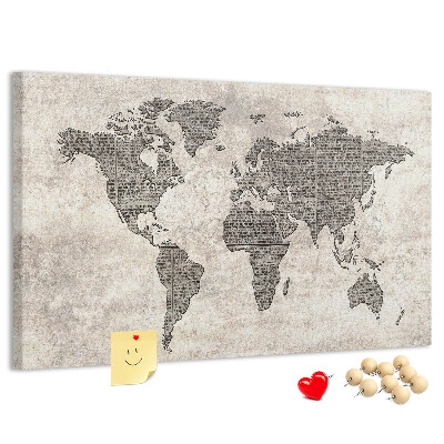 Prikbord met een wereldkaart en krantentextuur