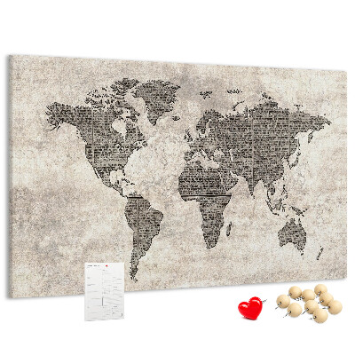 Prikbord met een wereldkaart en krantentextuur