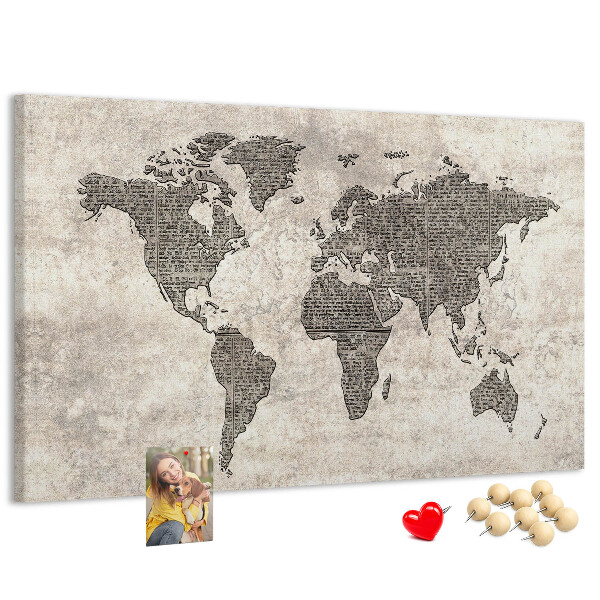 Prikbord met een wereldkaart en krantentextuur