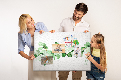Prikbord met groene bladeren op een lichte achtergrond