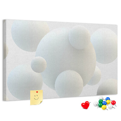 Kurk prikbord met witte ballen op een lichte achtergrond