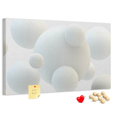 Kurk prikbord met witte ballen op een lichte achtergrond