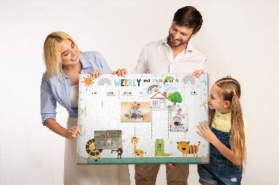 Kurk prikbord met een kleurrijke weekplanner en dierenprint