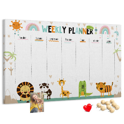Kurk prikbord met een kleurrijke weekplanner en dierenprint