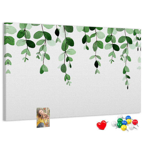 Prikbord met een print van groene bladeren in een verfijnde aquareltechniek